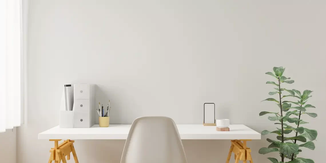 Minimalist home office organization with white desk and chair