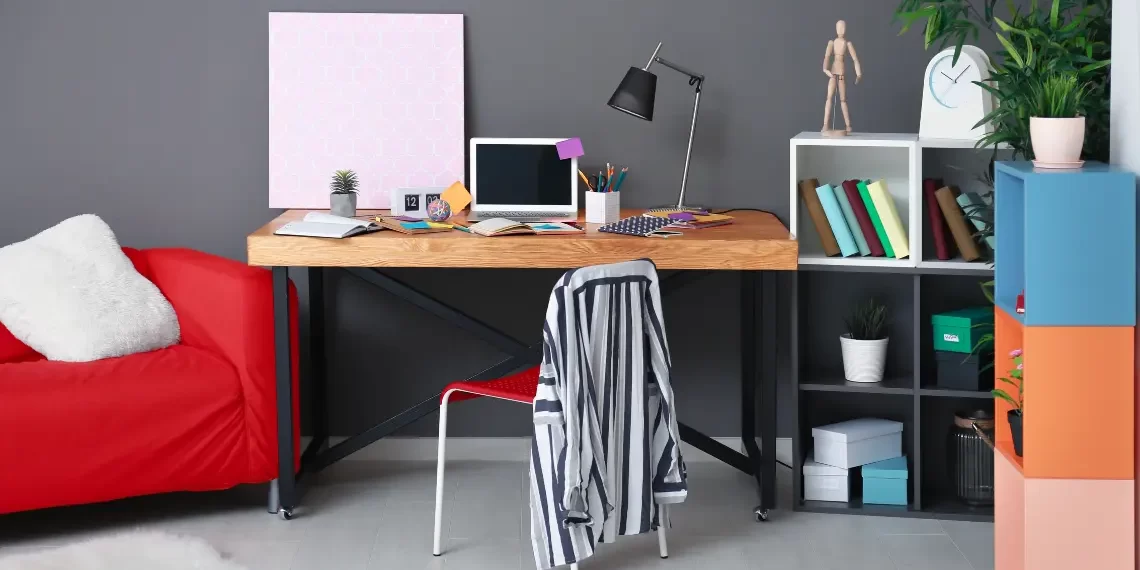 Work from home technology essentials with a modern desk and ergonomic chair